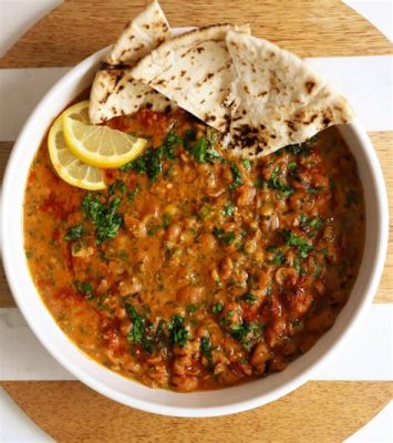  Ful Medames: Ein vegetarisches Meisterwerk aus Zamalek das die Geschmacksknospen tanzen lässt und den Hunger in einen Freudenschrei verwandelt!